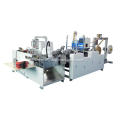 Handle inserting machine for paper bags